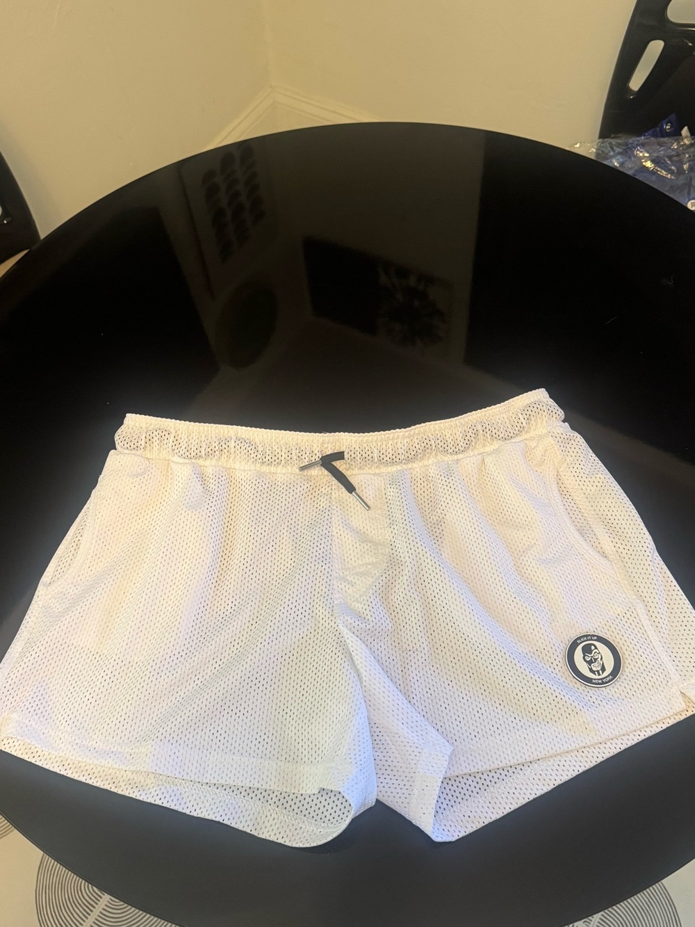 Slick It Up - White Mesh Athletic Shorts with Logo Patch